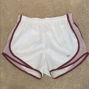 Nike Dri-Fit women’s running shorts, white and purple/maroon, size XS